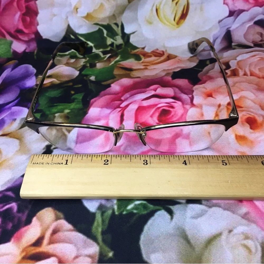 Prada Black top rim & Gold metal bottom rim and arms Good stored condition